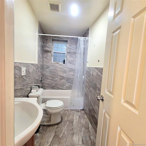 39-73 64th Street, Woodside, NY 11377