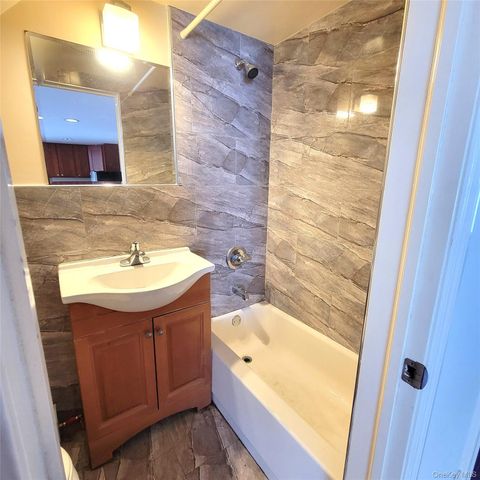 39-73 64th Street, Woodside, NY 11377