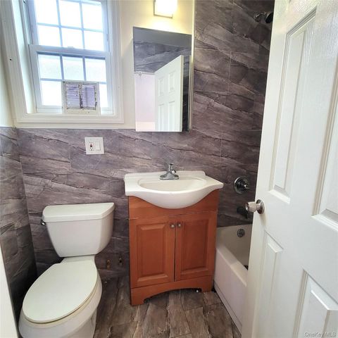 39-73 64th Street, Woodside, NY 11377