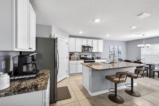 13765 WHISKEY DAISY DRIVE, Dade City, FL 33525