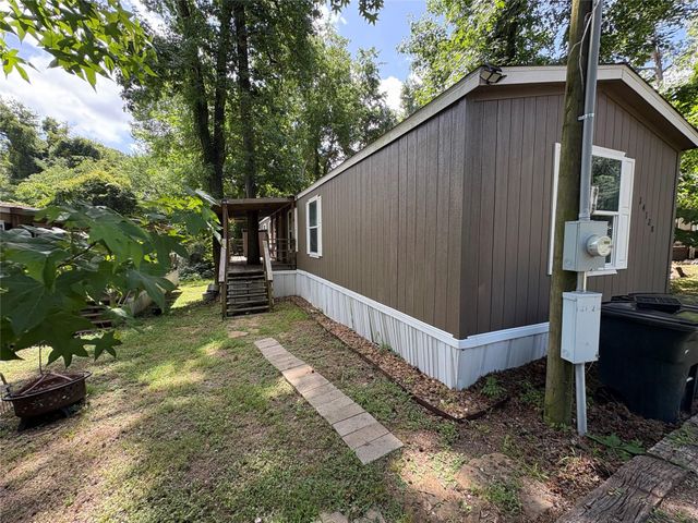 14128 Shadow Bay Drive, Willis, TX 77318