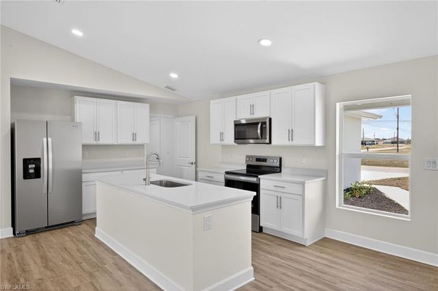 702 NW Douglas CIR, Cape Coral, FL 33993