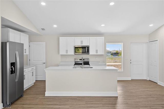 702 NW Douglas CIR, Cape Coral, FL 33993