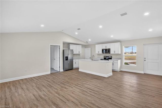 702 NW Douglas CIR, Cape Coral, FL 33993