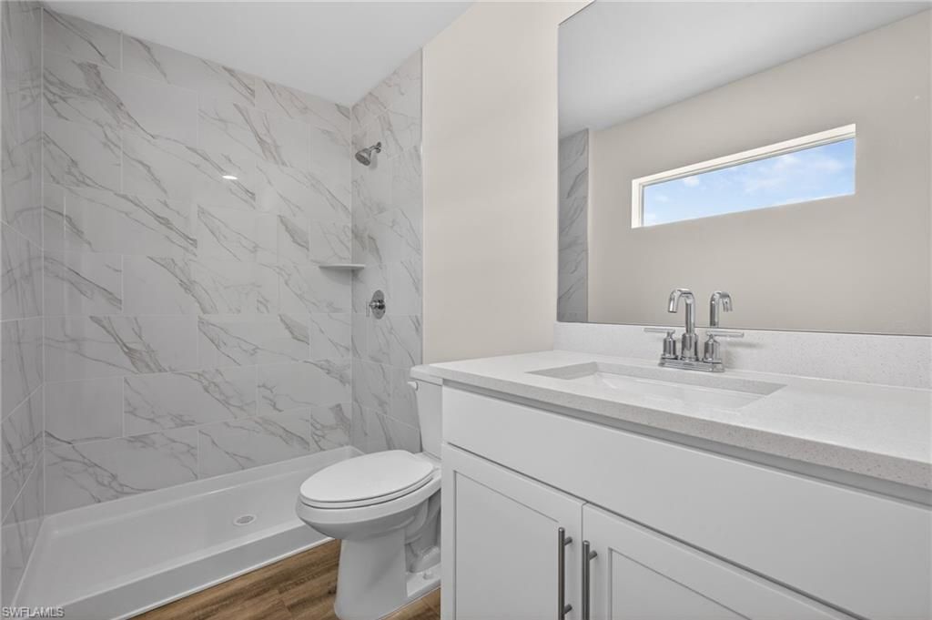 702 NW Douglas CIR, CAPE CORAL, FL 33993 — photo 4