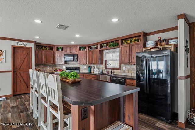 13709 KATIE JOHNSON Lane, Sanderson, FL 32087