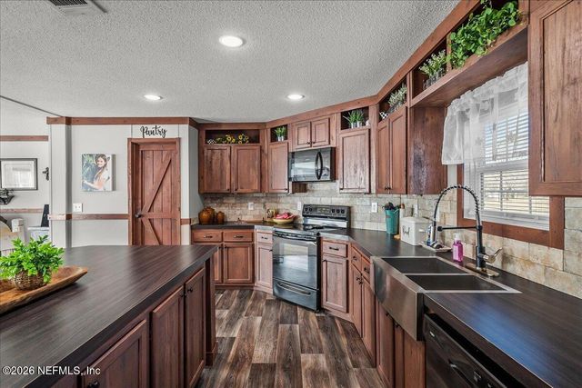 13709 KATIE JOHNSON Lane, Sanderson, FL 32087