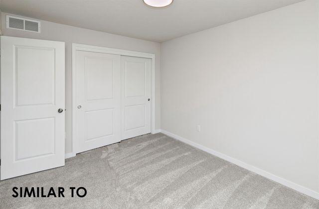 1120 Featherstone Avenue NE, Bondurant, IA 50035