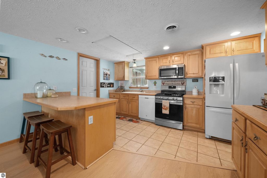 Image 15 of property listing at 481 Lake Drive NE, Kalkaska, MI 49646