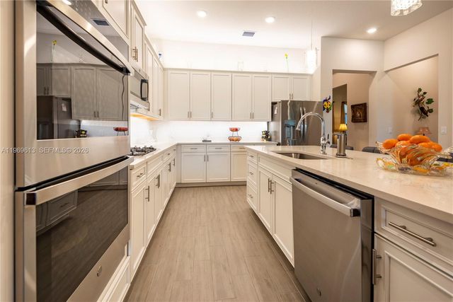 7718 N Blue Spring Dr, Parkland, FL 33067