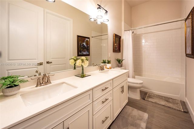 7718 N Blue Spring Dr, Parkland, FL 33067