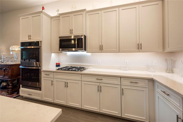 7718 N Blue Spring Dr, Parkland, FL 33067