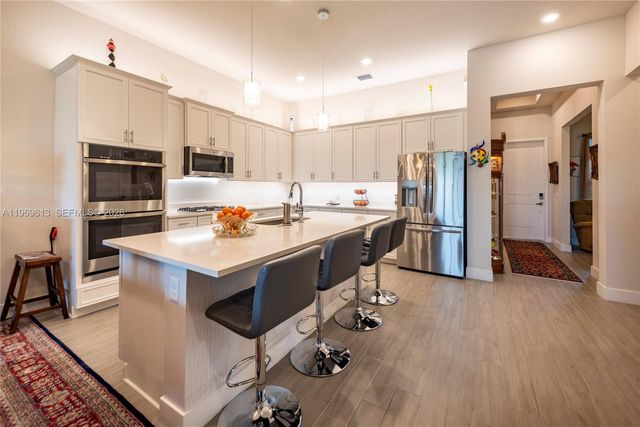 7718 N Blue Spring Dr, Parkland, FL 33067