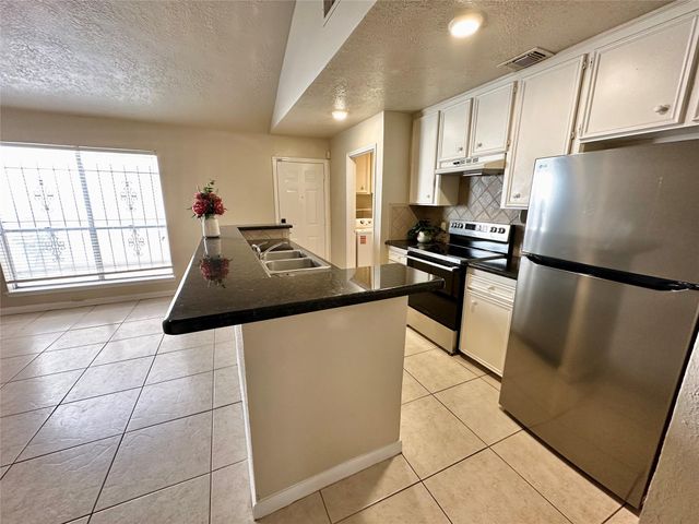 9164 Wilcrest Drive 9164, Houston, TX 77099