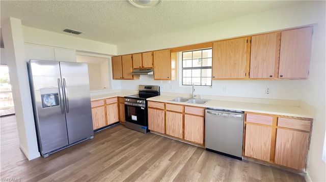 824 Frederick Reid ST E, Lehigh Acres, FL 33974