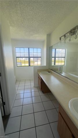 824 Frederick Reid ST E, Lehigh Acres, FL 33974