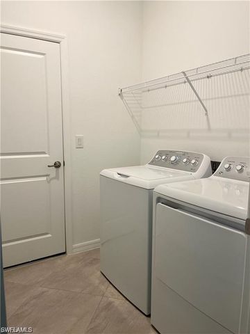 2057 Tamarron LN, Naples, FL 34120