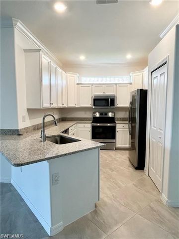 2057 Tamarron LN, Naples, FL 34120