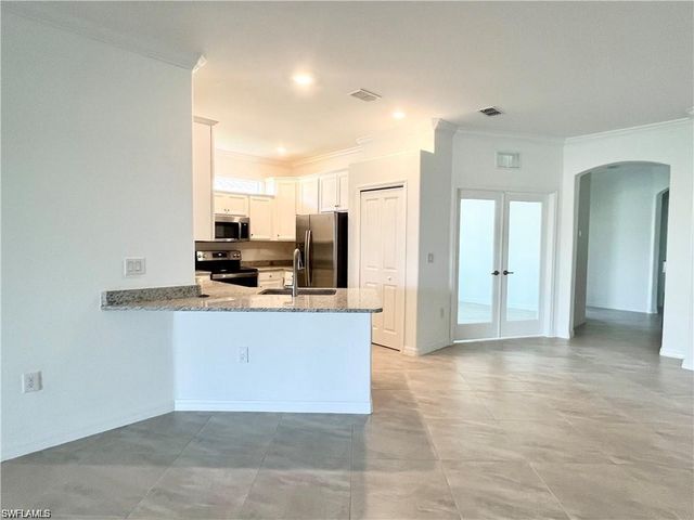 2057 Tamarron LN, Naples, FL 34120