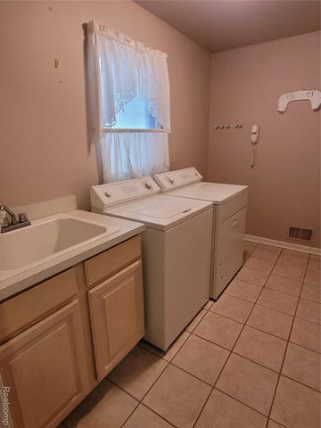 48205 Conifer Drive, Shelby Charter Township, MI 48315