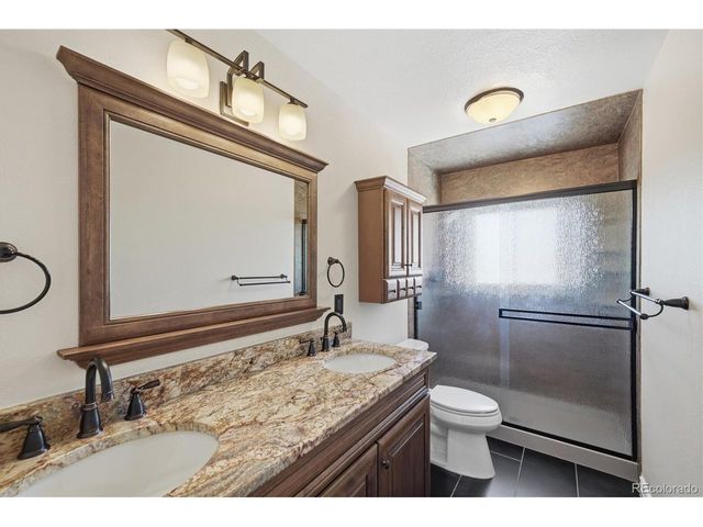 7753 Saulsbury St, Arvada, CO 80003