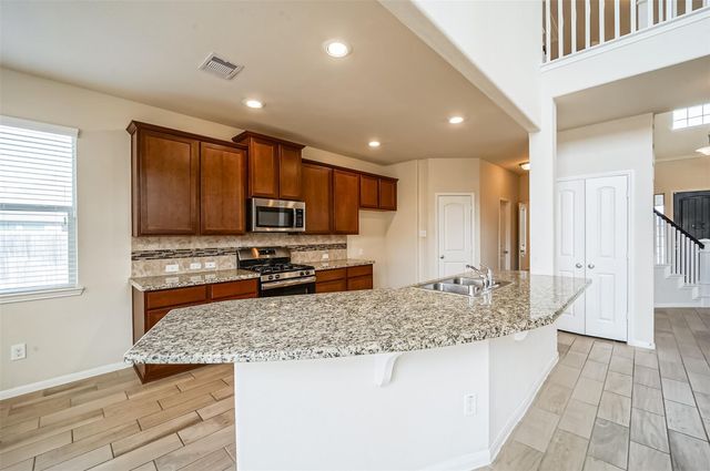 10003 Open Slope Court, Humble, TX 77396