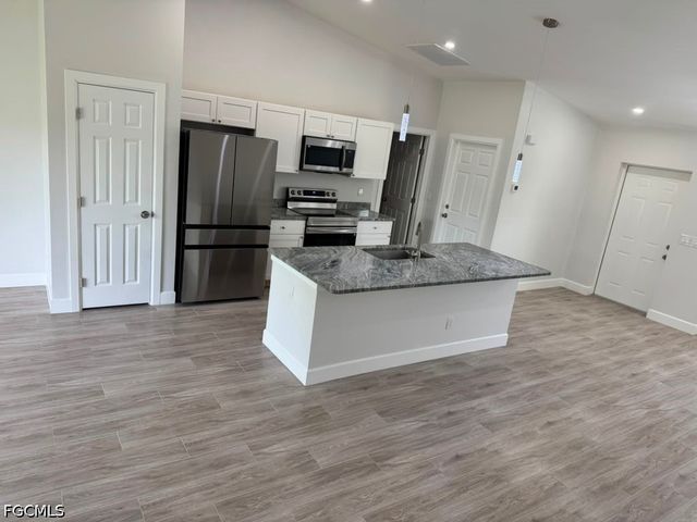 3707 32nd ST SW, Lehigh Acres, FL 33976