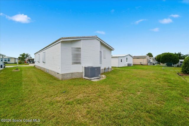 1907 Big Cypress Street NE, Palm Bay, FL 32905