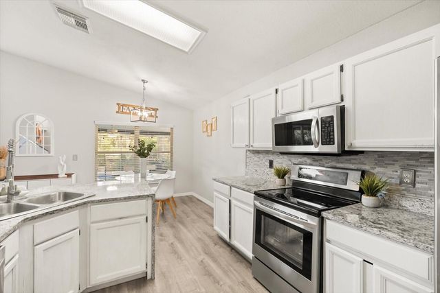 1003 WHARF CREEK COURT, Oviedo, FL 32765