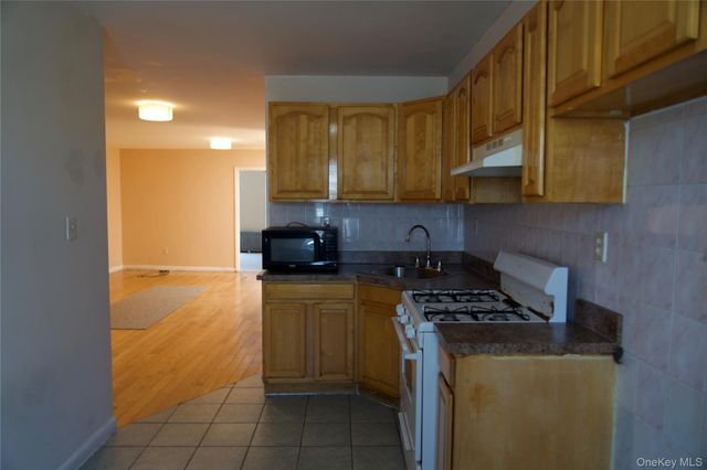 97-43 76th Street, Ozone Park, NY 11416