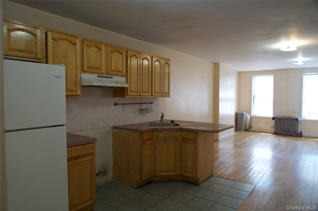 97-43 76th Street, Ozone Park, NY 11416