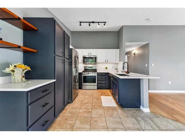 8485 Pebble Creek Way 13-203, Highlands Ranch, CO 80126