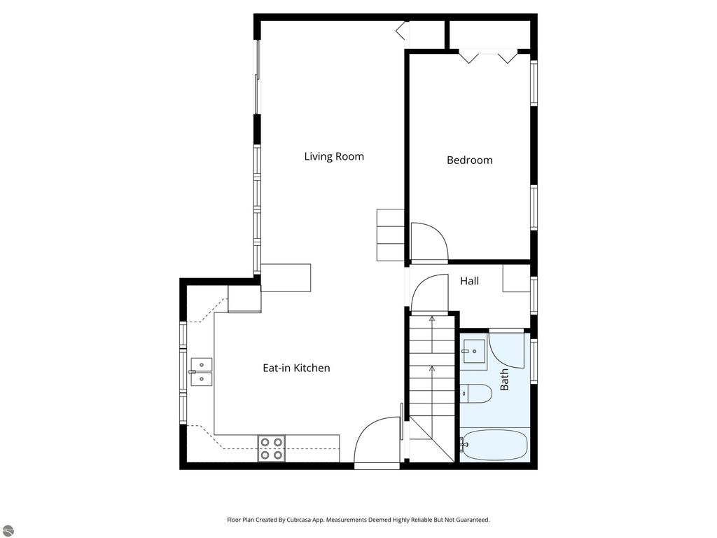 Floor plan of a waterfront home at 4411 Lakeview Trail, Traverse City, MI, featuring layout of living room, bedroom, eat-in kitchen, hall, and bathroom.