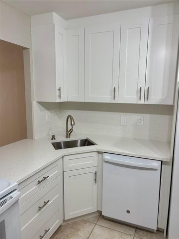 801 THREE ISLANDS Boulevard 214, Hallandale Beach, FL 33009