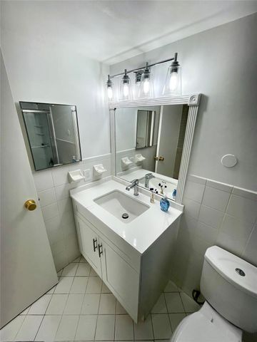 801 THREE ISLANDS Boulevard 214, Hallandale Beach, FL 33009