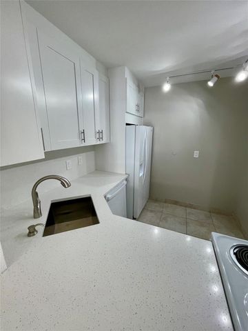 801 THREE ISLANDS Boulevard 214, Hallandale Beach, FL 33009