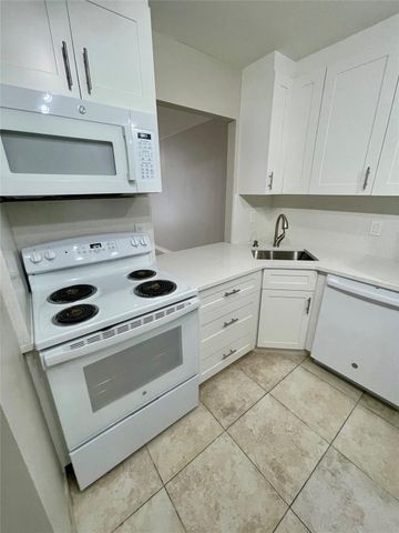 801 THREE ISLANDS Boulevard 214, Hallandale Beach, FL 33009