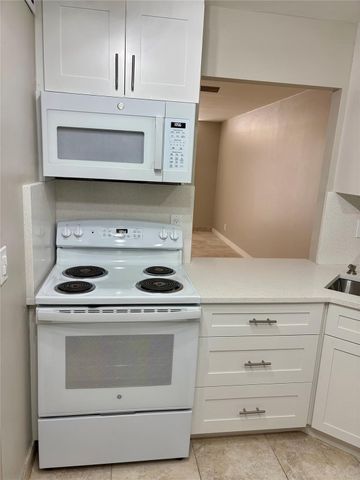 801 THREE ISLANDS Boulevard 214, Hallandale Beach, FL 33009