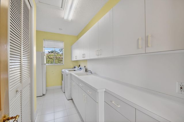 1711 Breakers West Boulevard, West Palm Beach, FL 33411