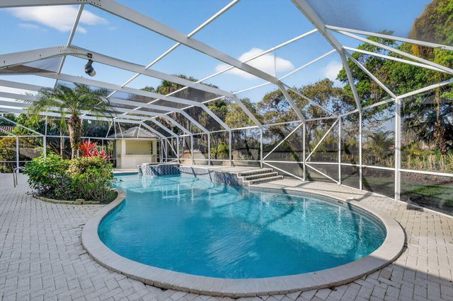 1711 Breakers West Boulevard, West Palm Beach, FL 33411