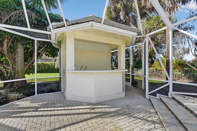 1711 Breakers West Boulevard, West Palm Beach, FL 33411