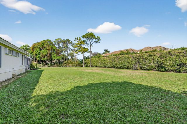 1711 Breakers West Boulevard, West Palm Beach, FL 33411