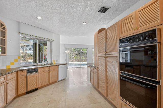 1711 Breakers West Boulevard, West Palm Beach, FL 33411