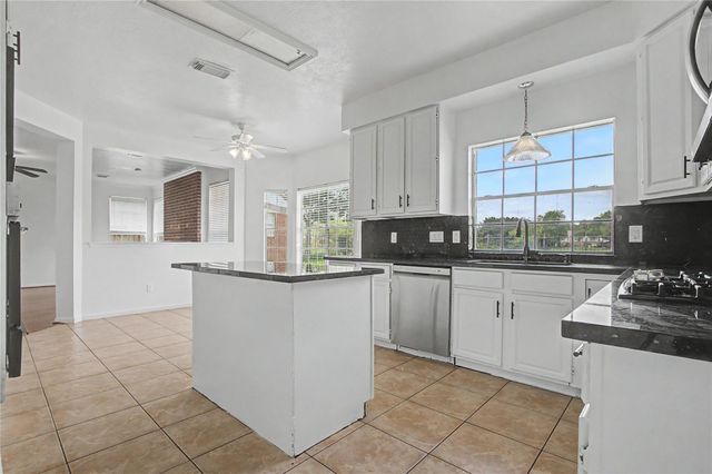 515 Spring Moss Drive, Missouri City, TX 77459
