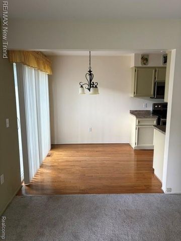 1412 Hidden Meadows Drive B, Walled Lake, MI 48390