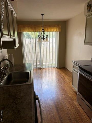 1412 Hidden Meadows Drive B, Walled Lake, MI 48390