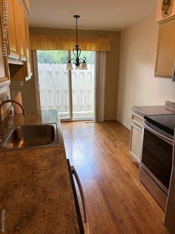 1412 Hidden Meadows Drive B, Walled Lake, MI 48390