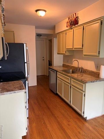 1412 Hidden Meadows Drive B, Walled Lake, MI 48390