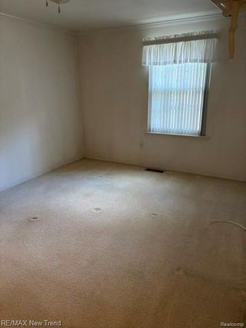 1412 Hidden Meadows Drive B, Walled Lake, MI 48390