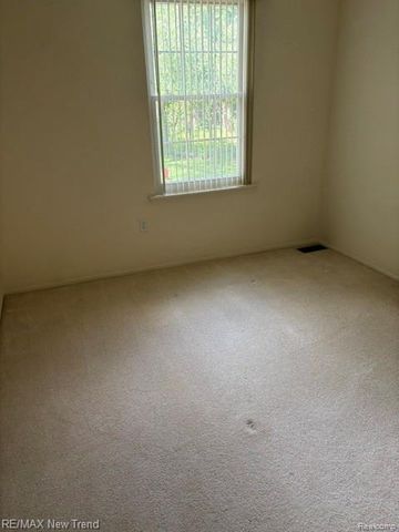 1412 Hidden Meadows Drive B, Walled Lake, MI 48390